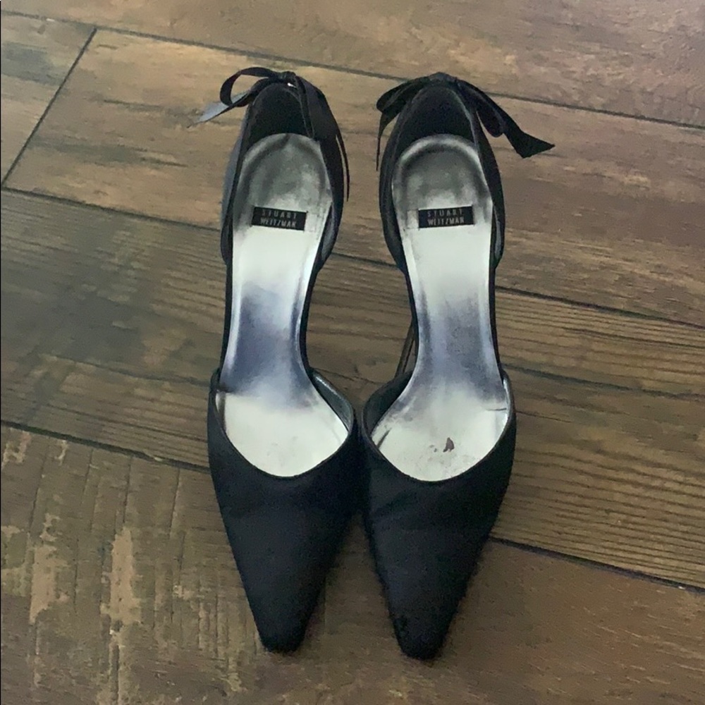 Stuart Weizmann black satin heels with bows.
